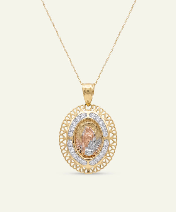 Gold necklace with a pendant on a white background