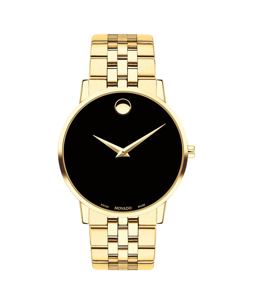 Gold watch with black face on a white background