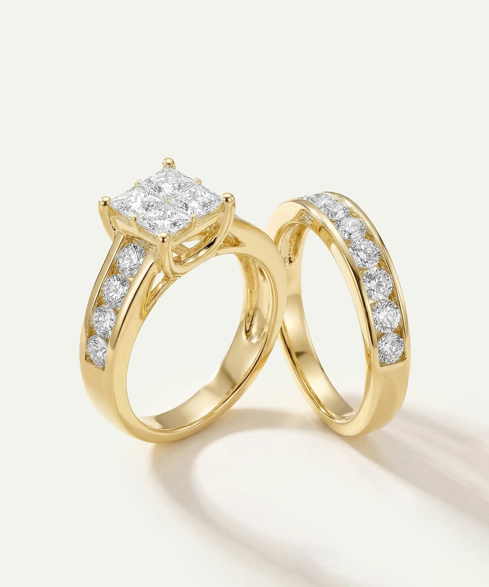 Yellow gold quad princess-cut diamond bridal engagement ring set shown on a hand.