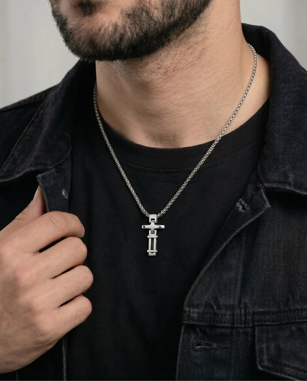 Close-up of Link N Lock® stainless steel cable cross pendant