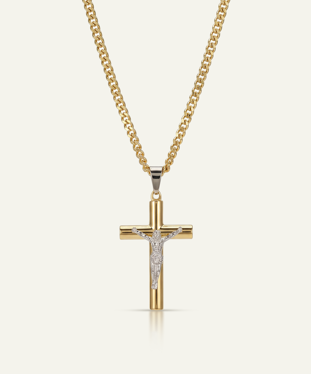 Gold cross pendant necklace with chain on a white background