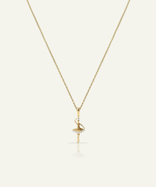 Gold necklace with a delicate pendant on a white background