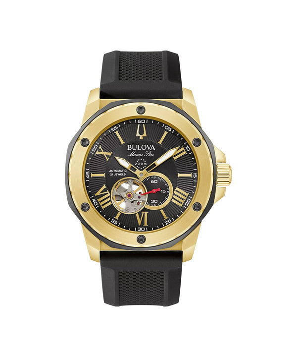 Gold watch with black face and rubber strap on a white background