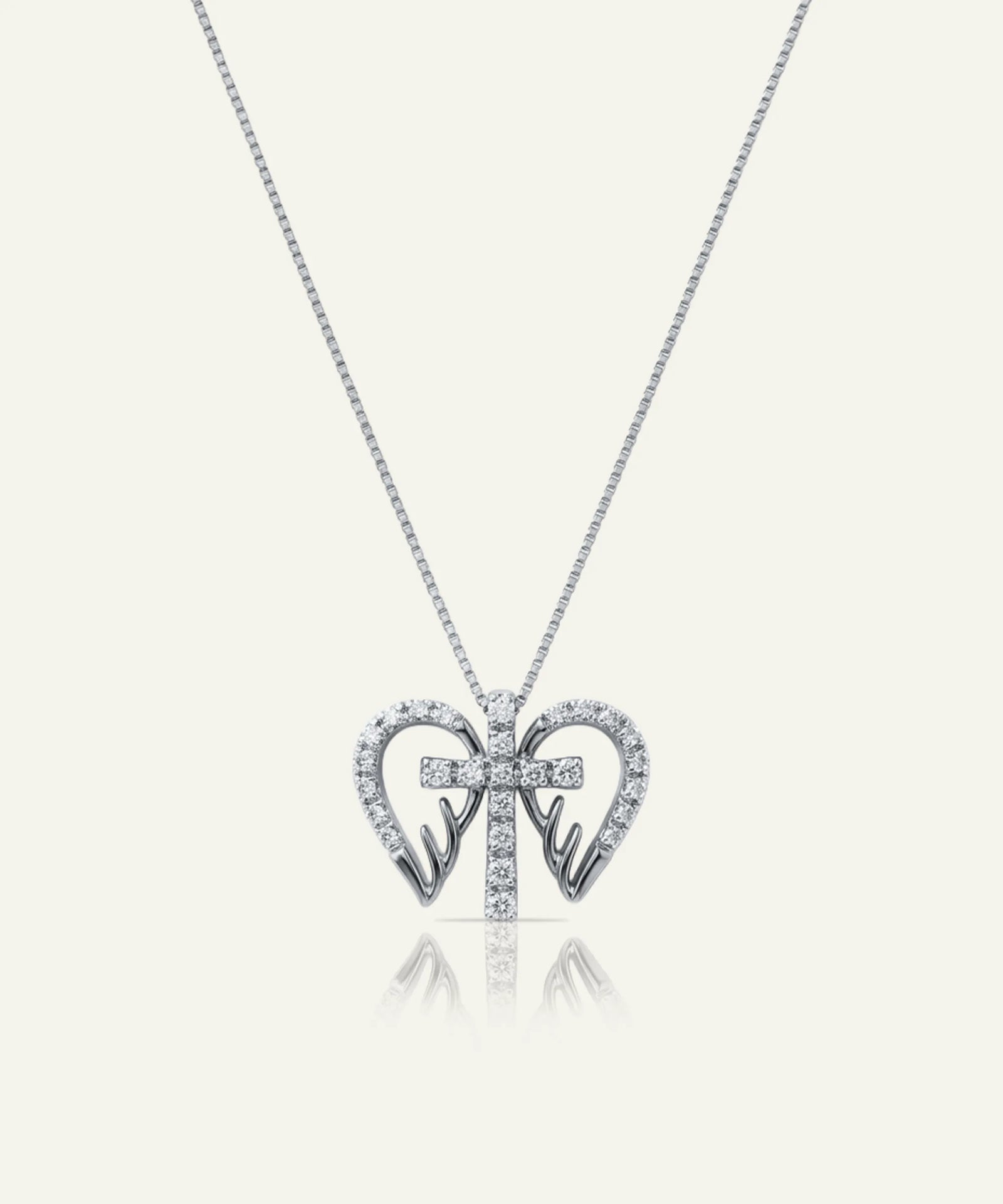 Diamond necklace with a red gemstone on a white background