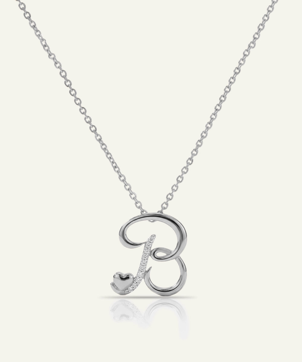 Silver necklace with a letter 'B' pendant on a white background
