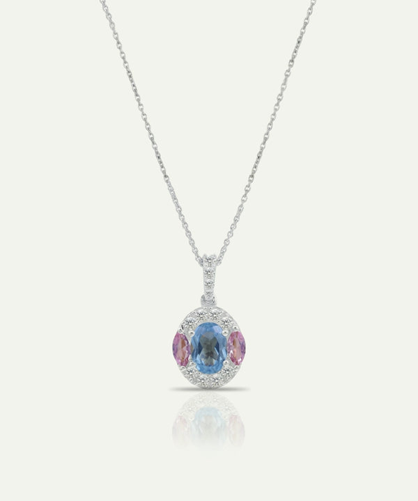 Necklace with a pendant featuring a blue and pink gemstone on a white background