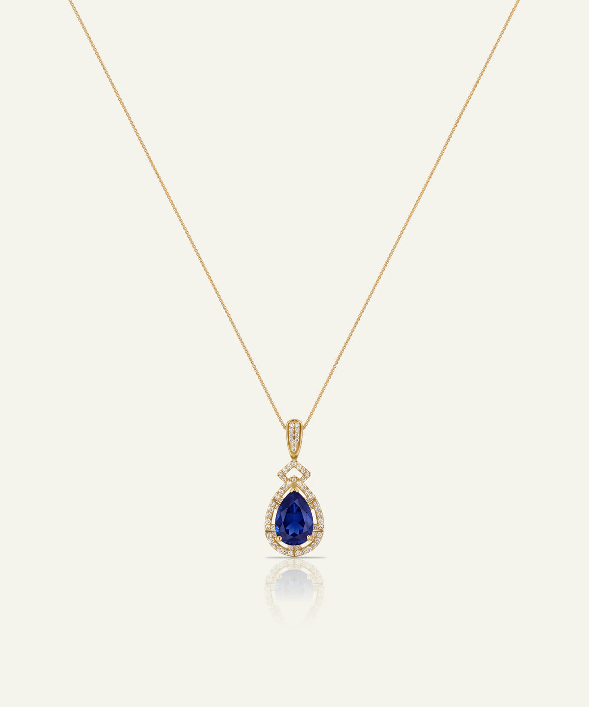 Aanika V® sapphire & diamond pear halo pendant at Valliani Jewelers