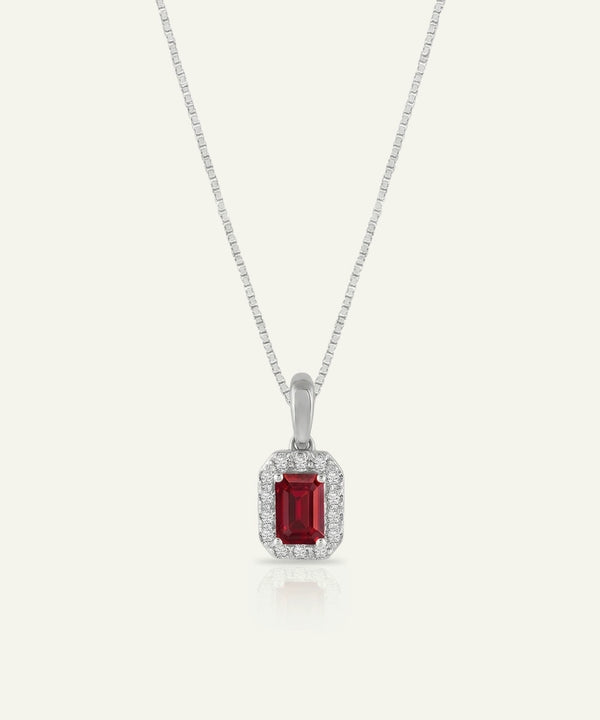 Ruby pendant necklace on a white background