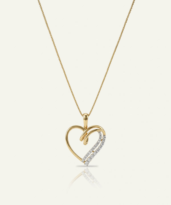 Gold heart-shaped pendant necklace on a white background