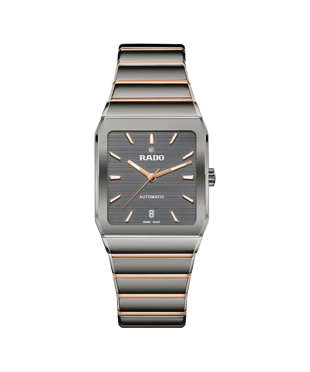 Rado watch with rose gold and silver band on a white background