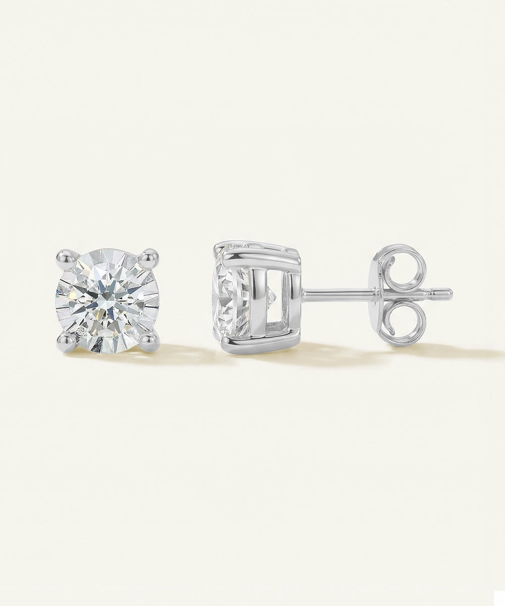 Diamond stud earrings on a white background