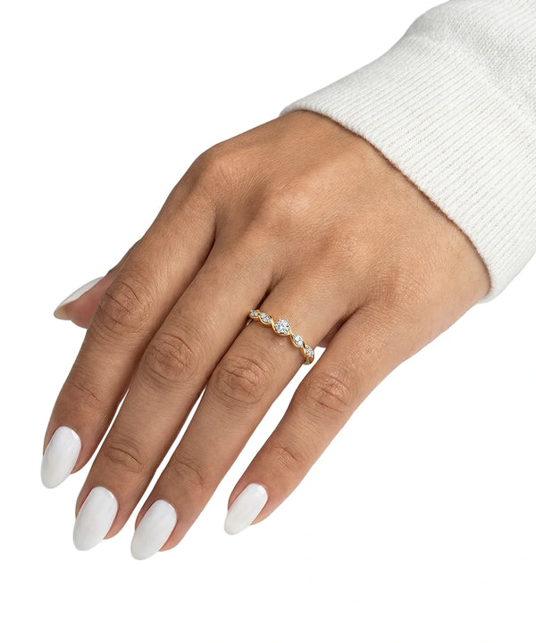 Hand wearing a diamond ring with a white background