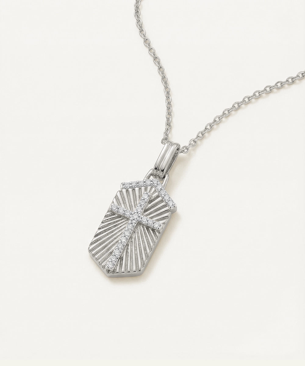 Silver pendant necklace on a white background