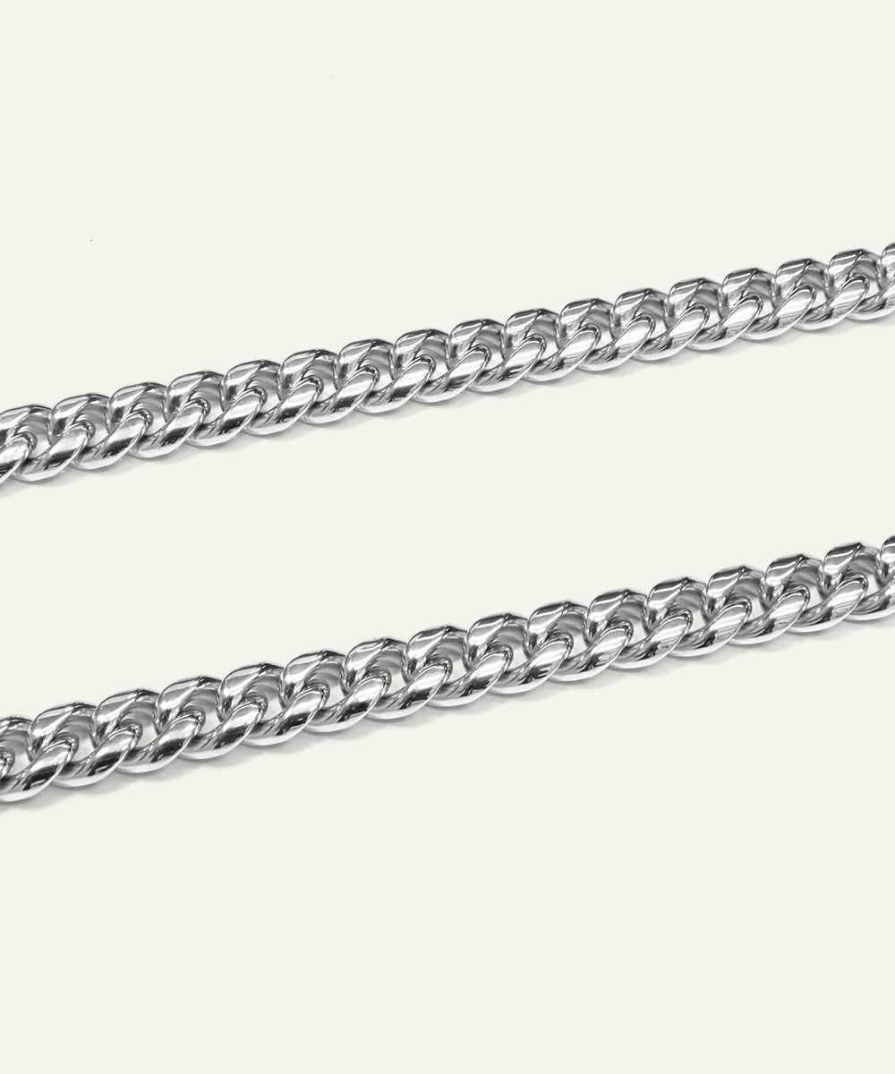 Two silver chain necklaces on a white background