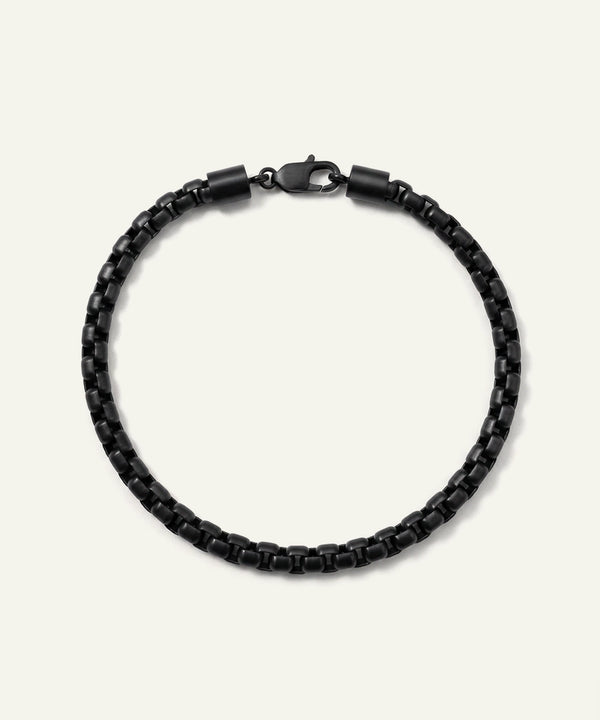 Black beaded bracelet on a white background