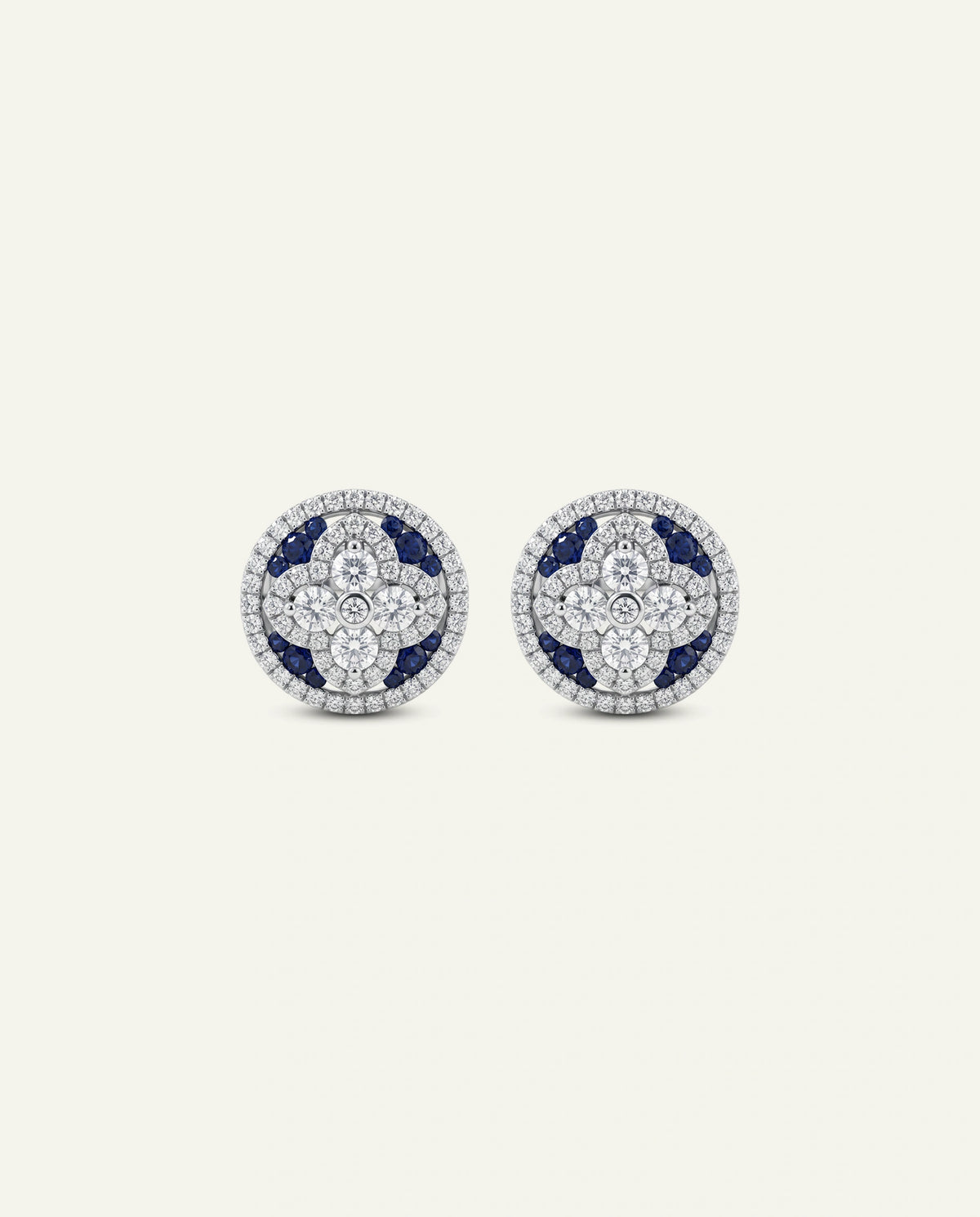 Gold heart-shaped earrings on a white background