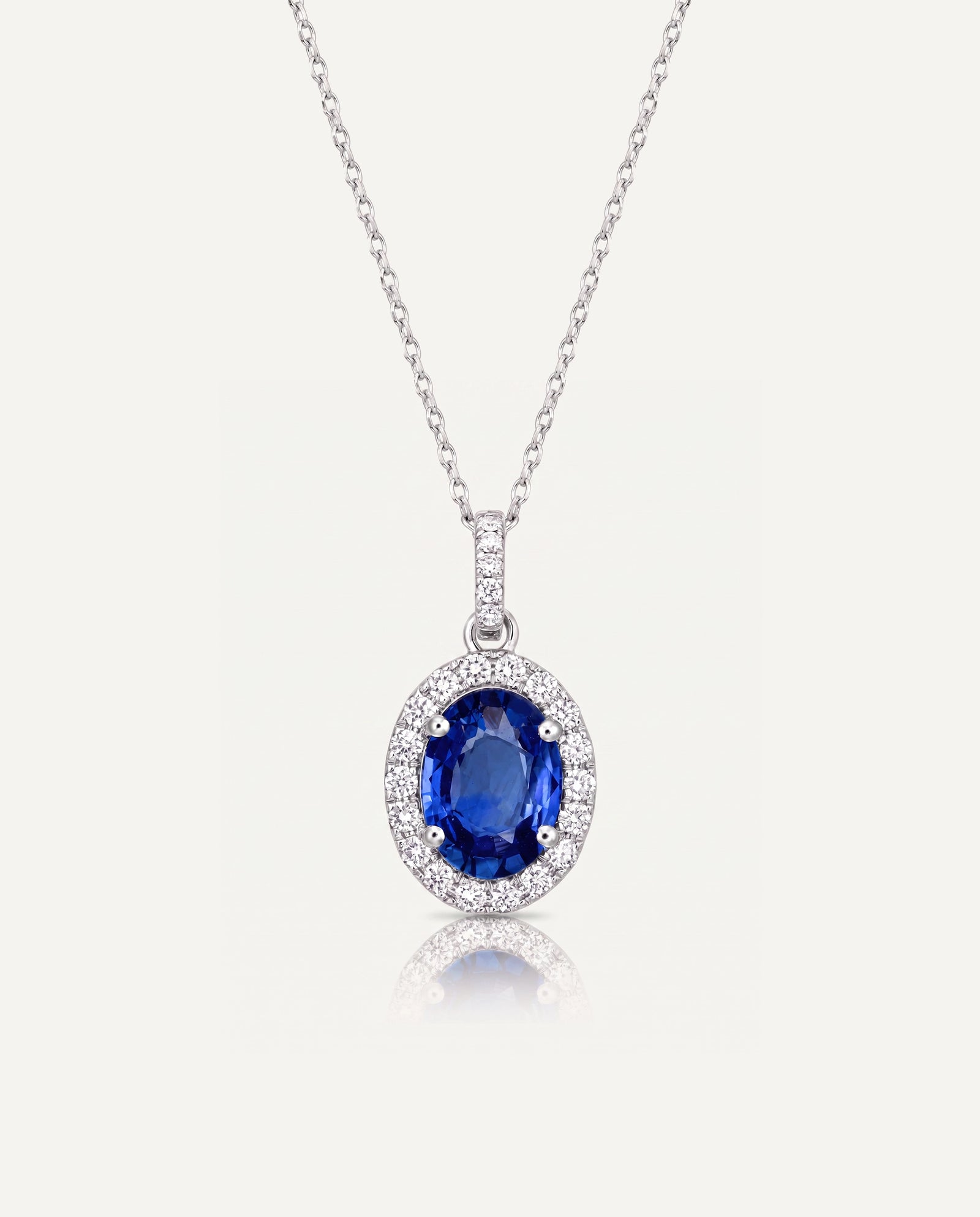 Aanika V. Oval Sapphire & Diamond Halo Pendant