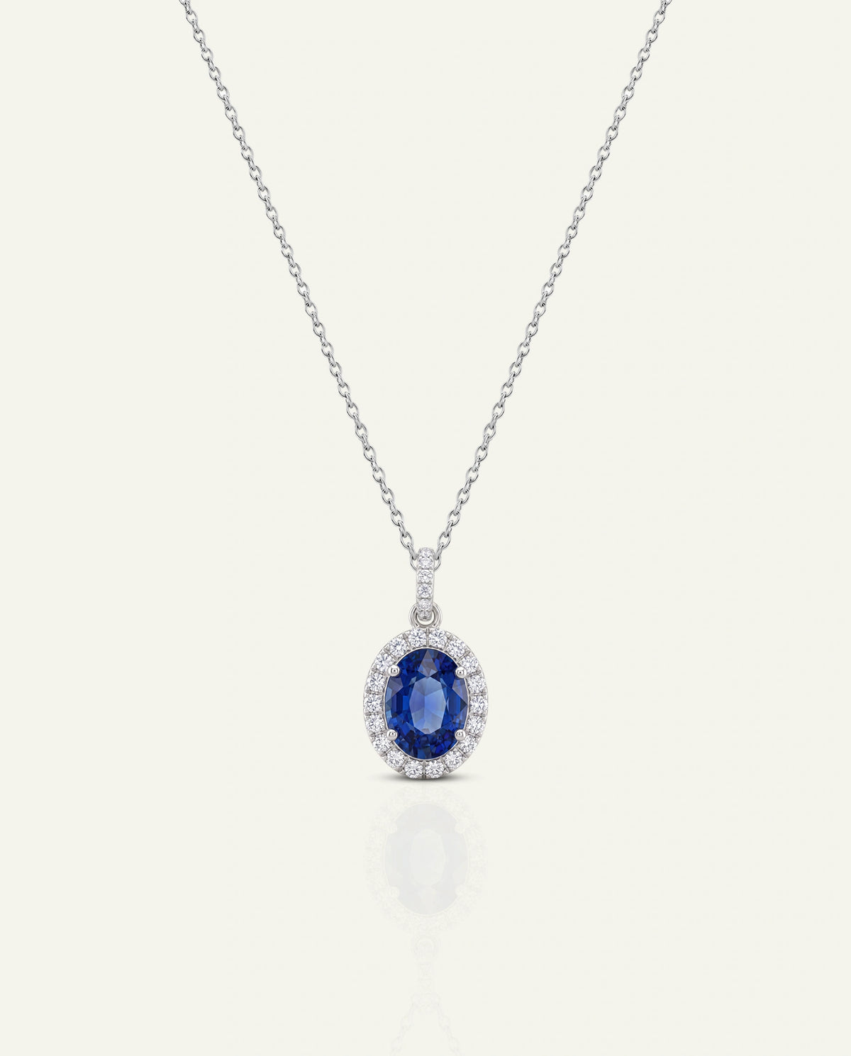 Aanika V. Oval Sapphire & Diamond Halo Pendant