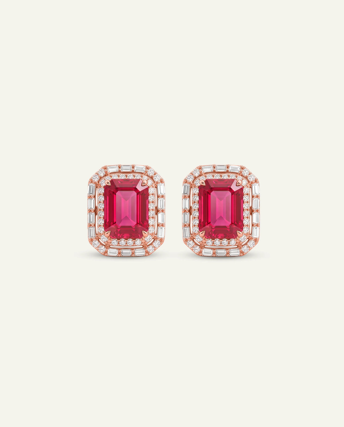 A pair of rectangular stud earrings featuring emerald-cut pink gemstones surrounded by small clear stones in a rose gold setting, presented on a light cream background.