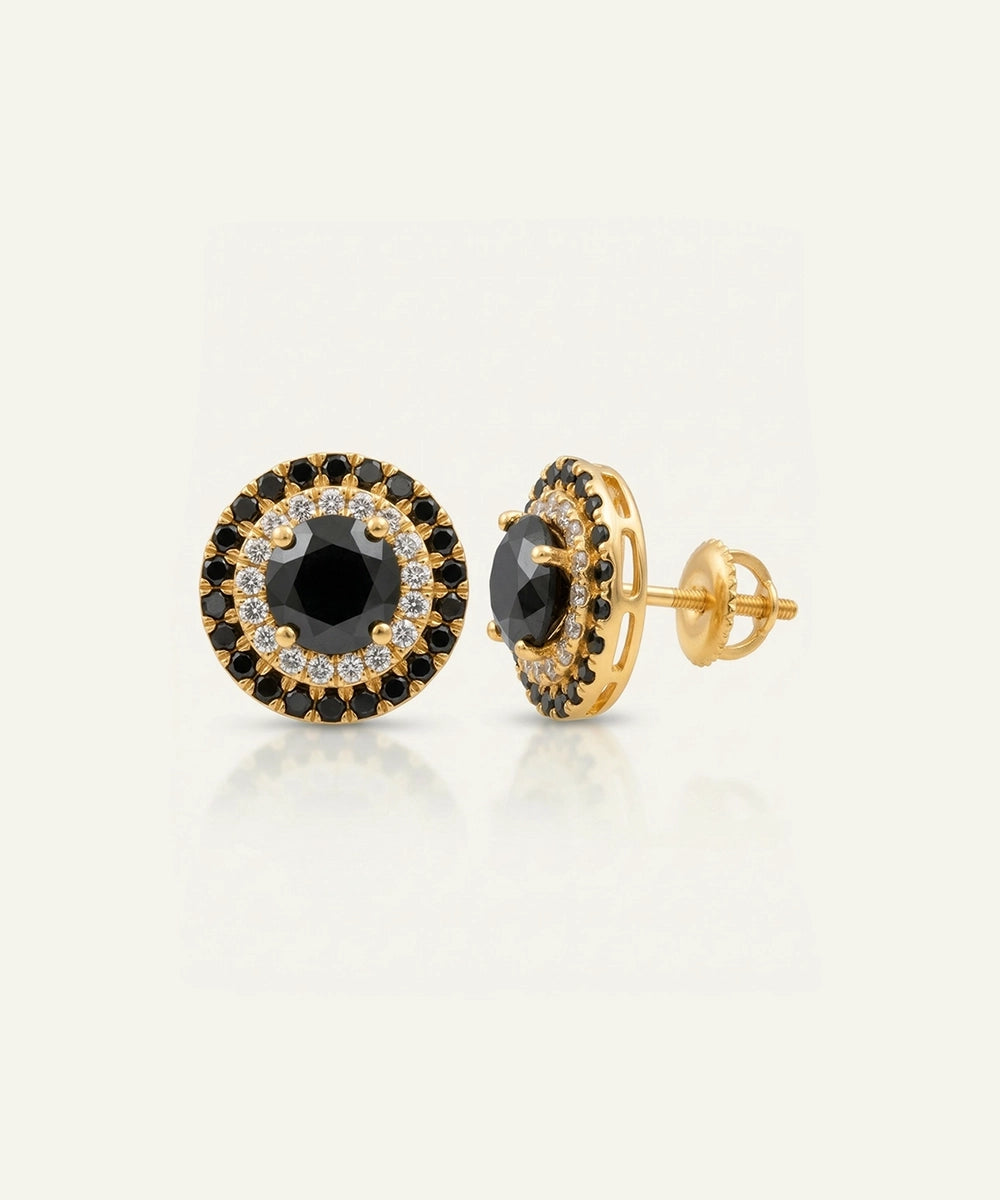 Close-up of men's black diamond cluster earrings in vermeil
