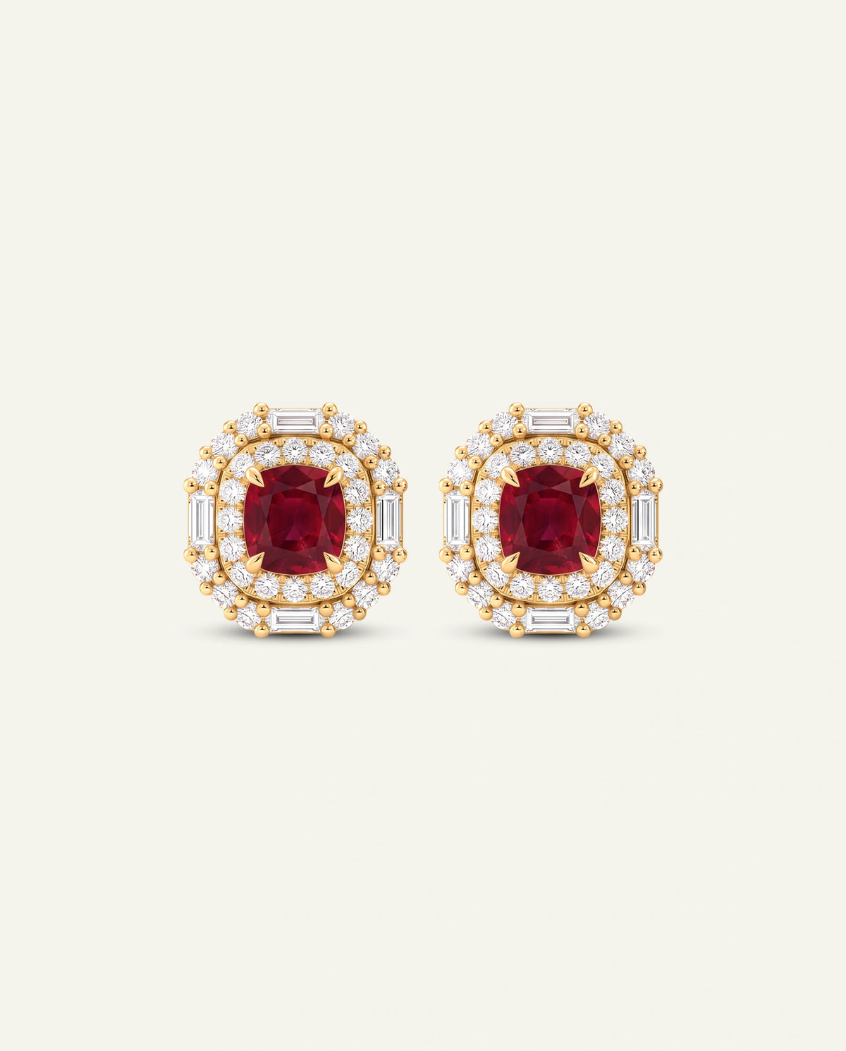 Pair of rose gold square earrings on a white background