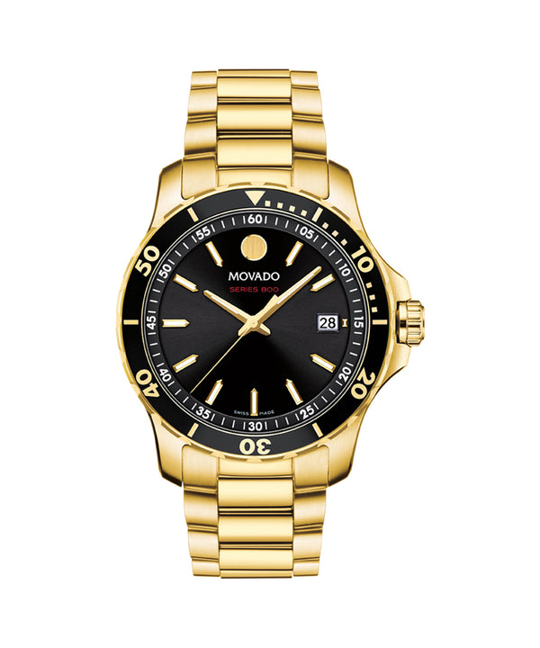Gold wristwatch with black dial on a white background