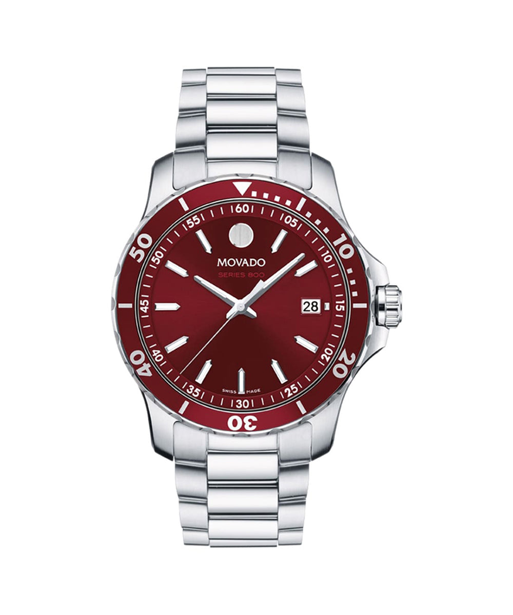 Movado watch with red dial and silver bracelet on a white background