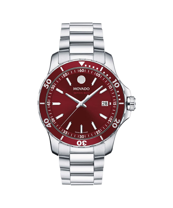 Movado watch with red dial and silver bracelet on a white background