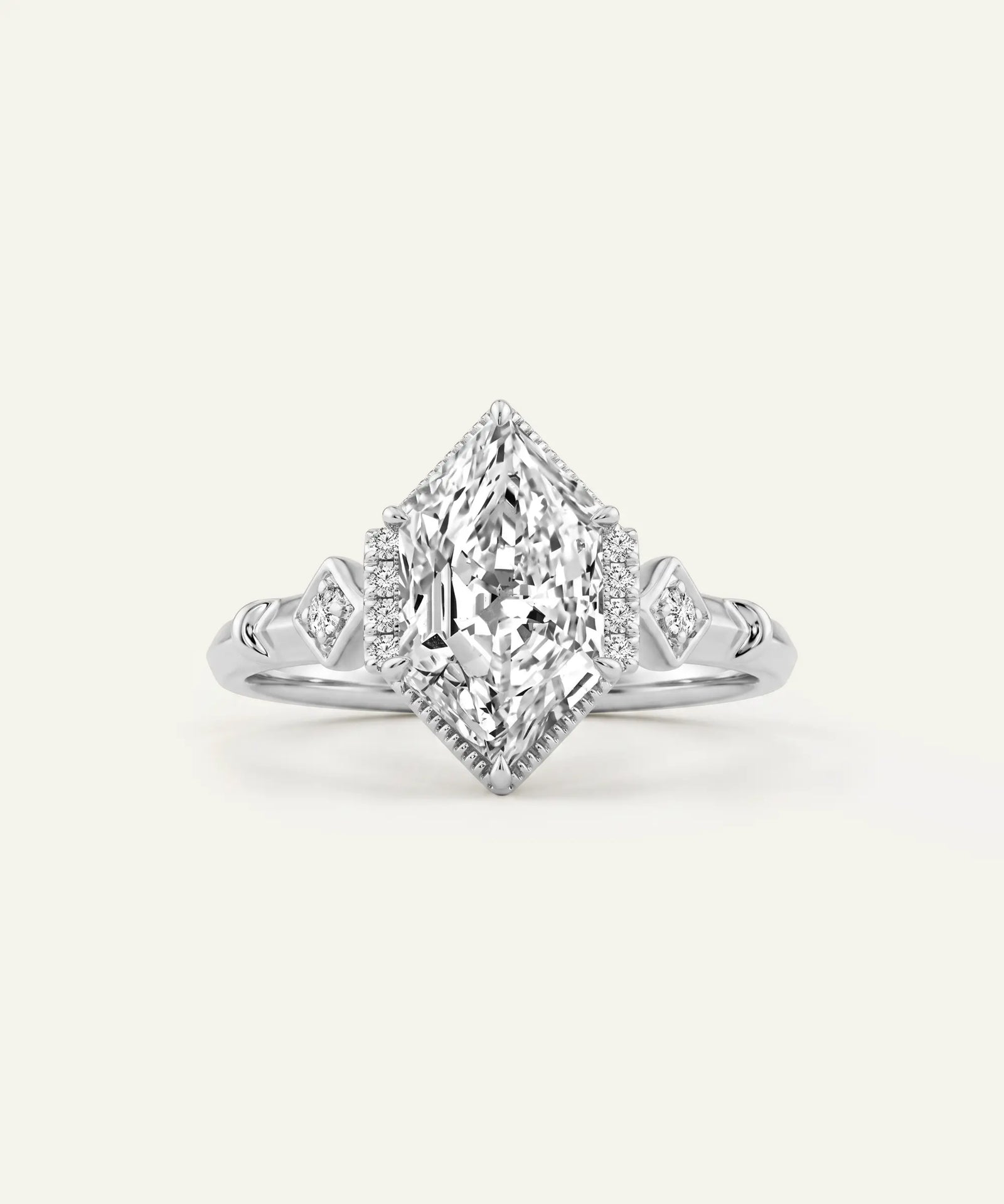 A radiant cut diamond engagement ring with a halo and a polished silver-colored band, centered on a light cream background.