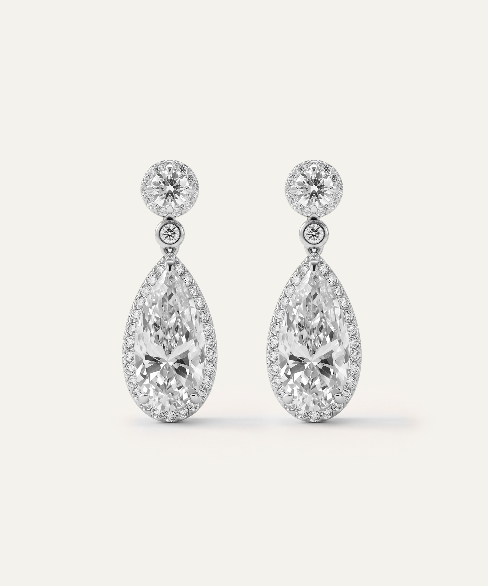 Ovani® Lab-grown Diamond Elongated Pear Halo Dangling Earrings