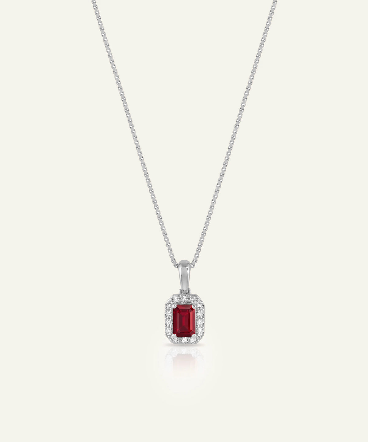Aanika V® ruby & lab-grown diamond round halo pendant at Valliani Jewelers