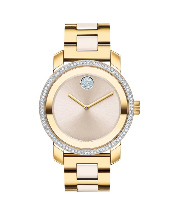 Gold wristwatch with a beige face on a white background