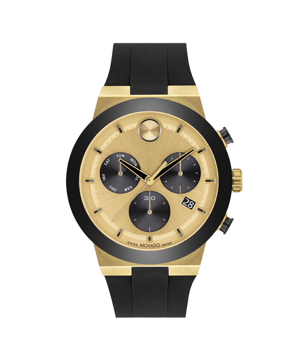 Gold and black watch with detailed face on a white background