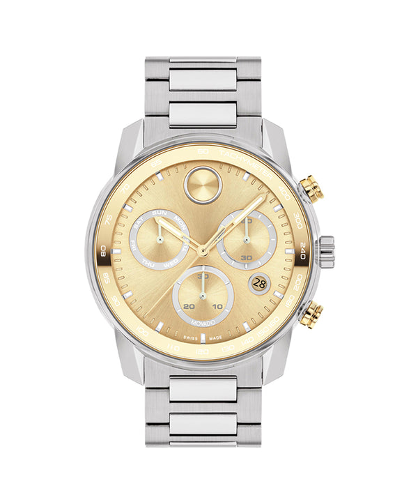 Silver and gold watch with a white background