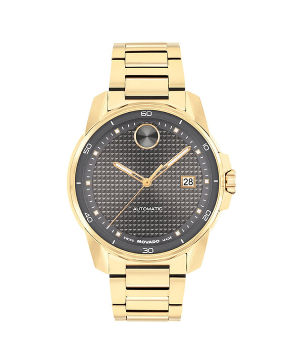 Gold wristwatch with black dial on a white background
