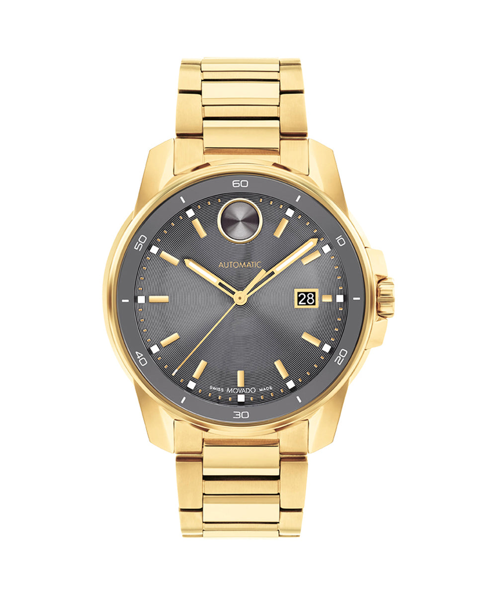 Gold wristwatch with a dark gray dial on a white background