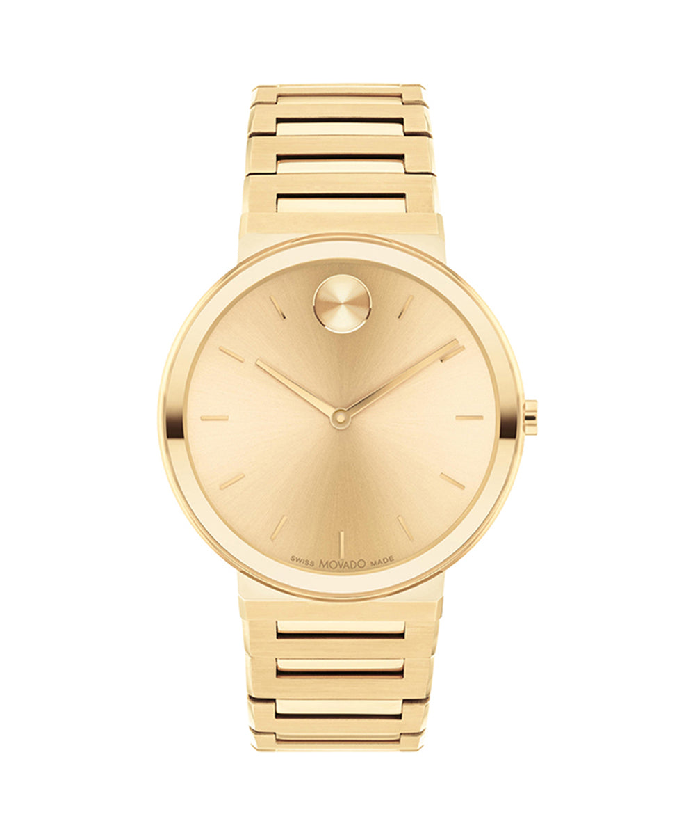 Gold wristwatch with a white background