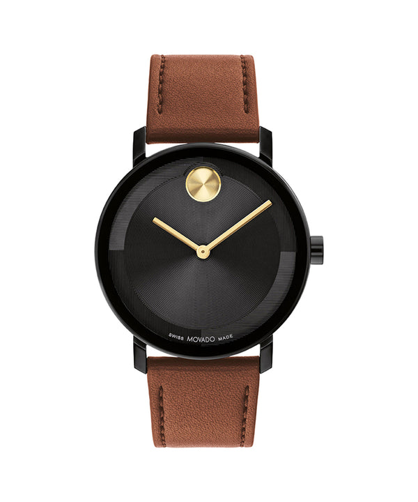 Watch with black face, gold hands, and brown leather strap on a white background