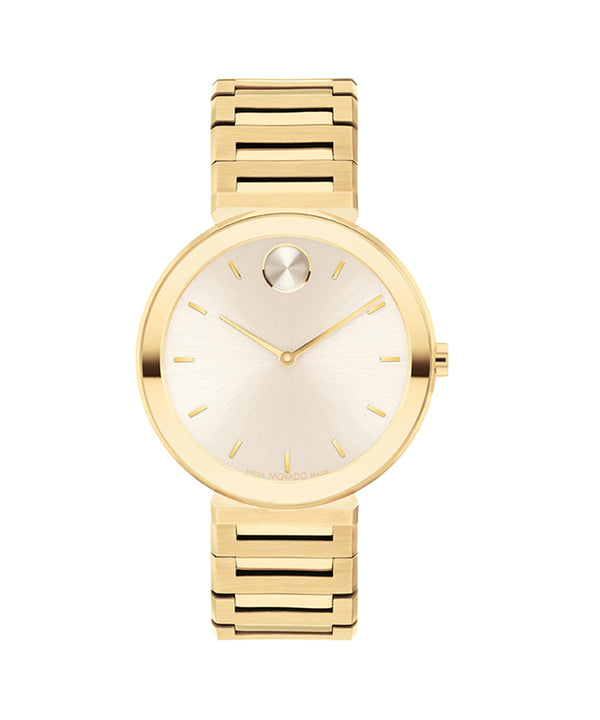 Gold wristwatch with a white face on a white background