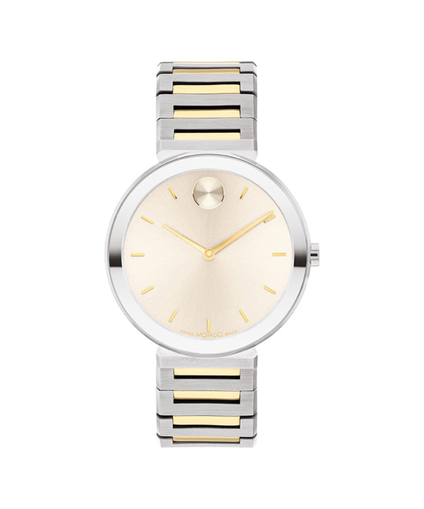 Two-tone watch with silver and gold band on a white background