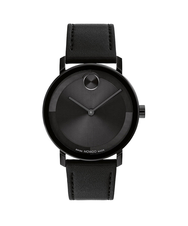 Black wristwatch with a black strap on a white background