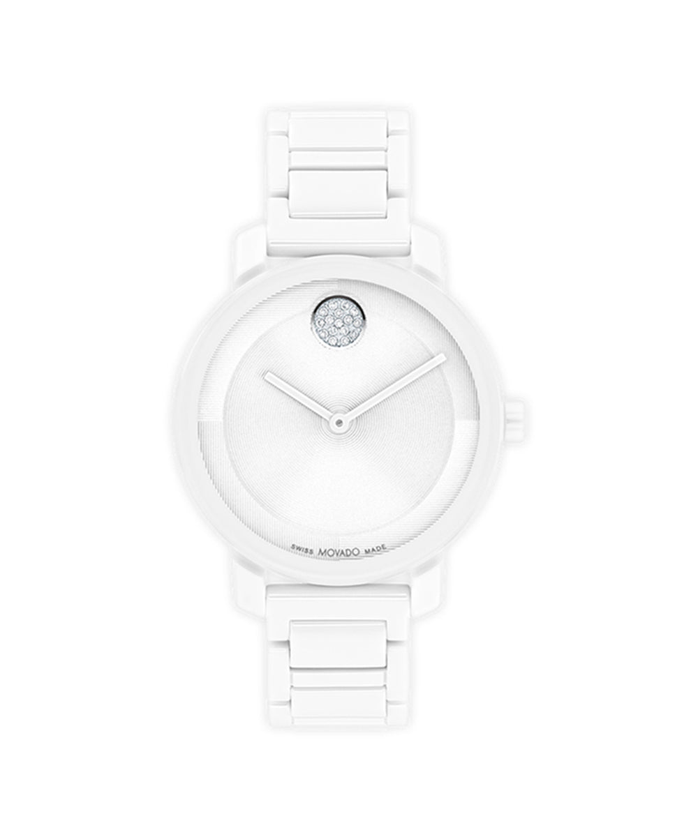 White watch with a diamond on the face against a white background