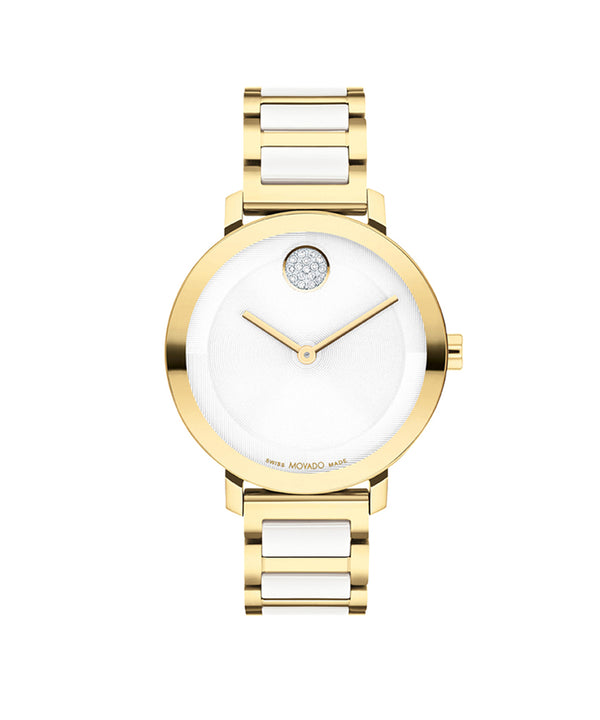 Gold and white watch with a diamond-like center on a white background