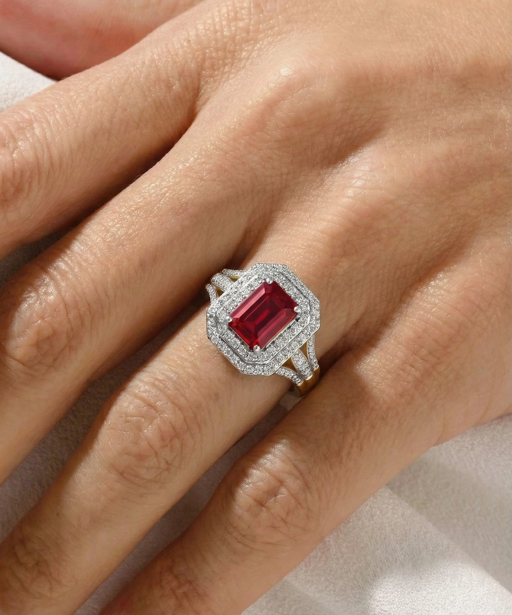 Ring with a red gemstone on a hand