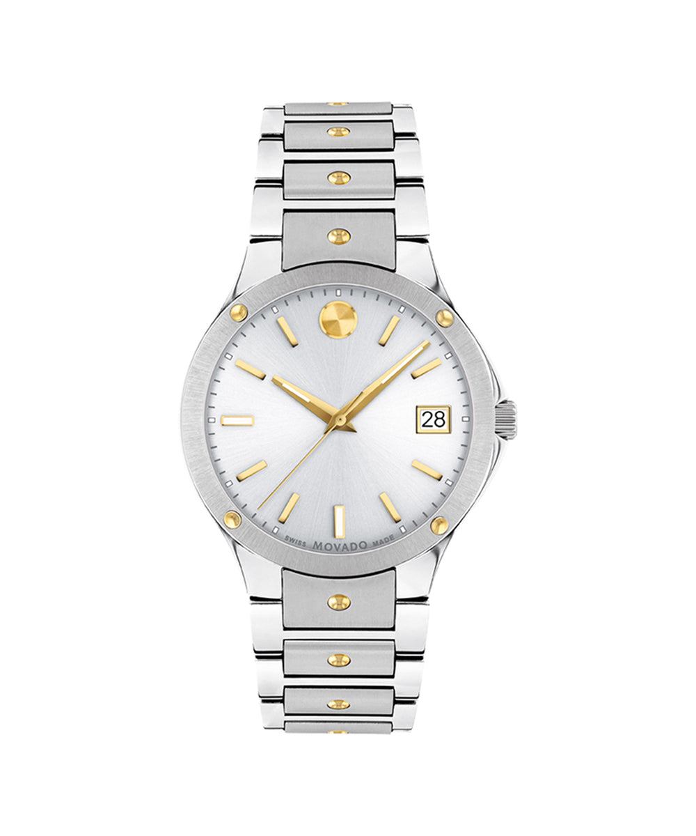 Silver and gold watch with a white face on a white background