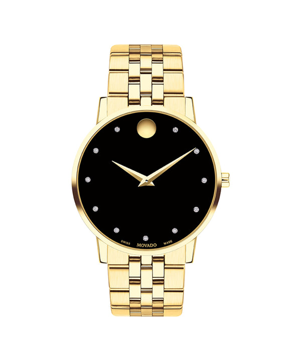 Gold watch with black face on a white background