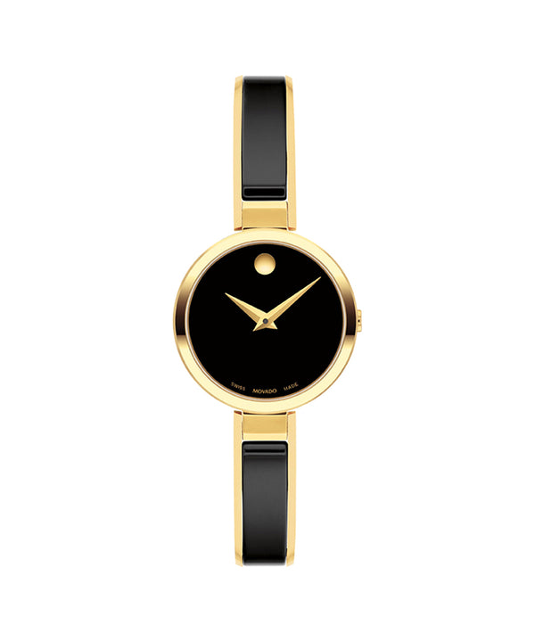 Gold watch with black strap and face on a white background