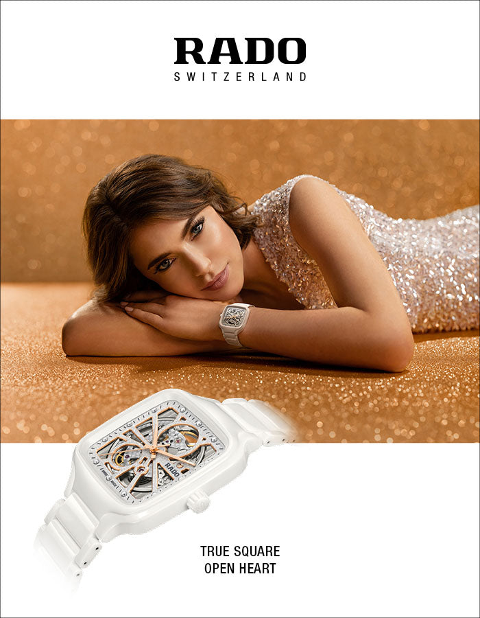 RADO Switzerland watch advertisement featuring a woman in a sparkling dress lying on a glittery gold surface, with a white square open-heart watch shown at the bottom and the text 'TRUE SQUARE OPEN HEART'.
