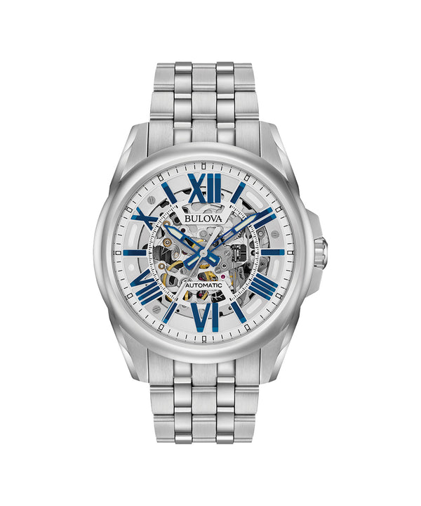 Silver Bulova watch with a white face and blue Roman numerals on a white background