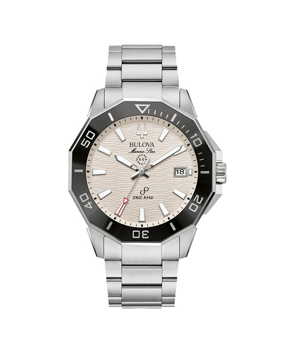 Bulova watch with silver bracelet and beige dial on a white background